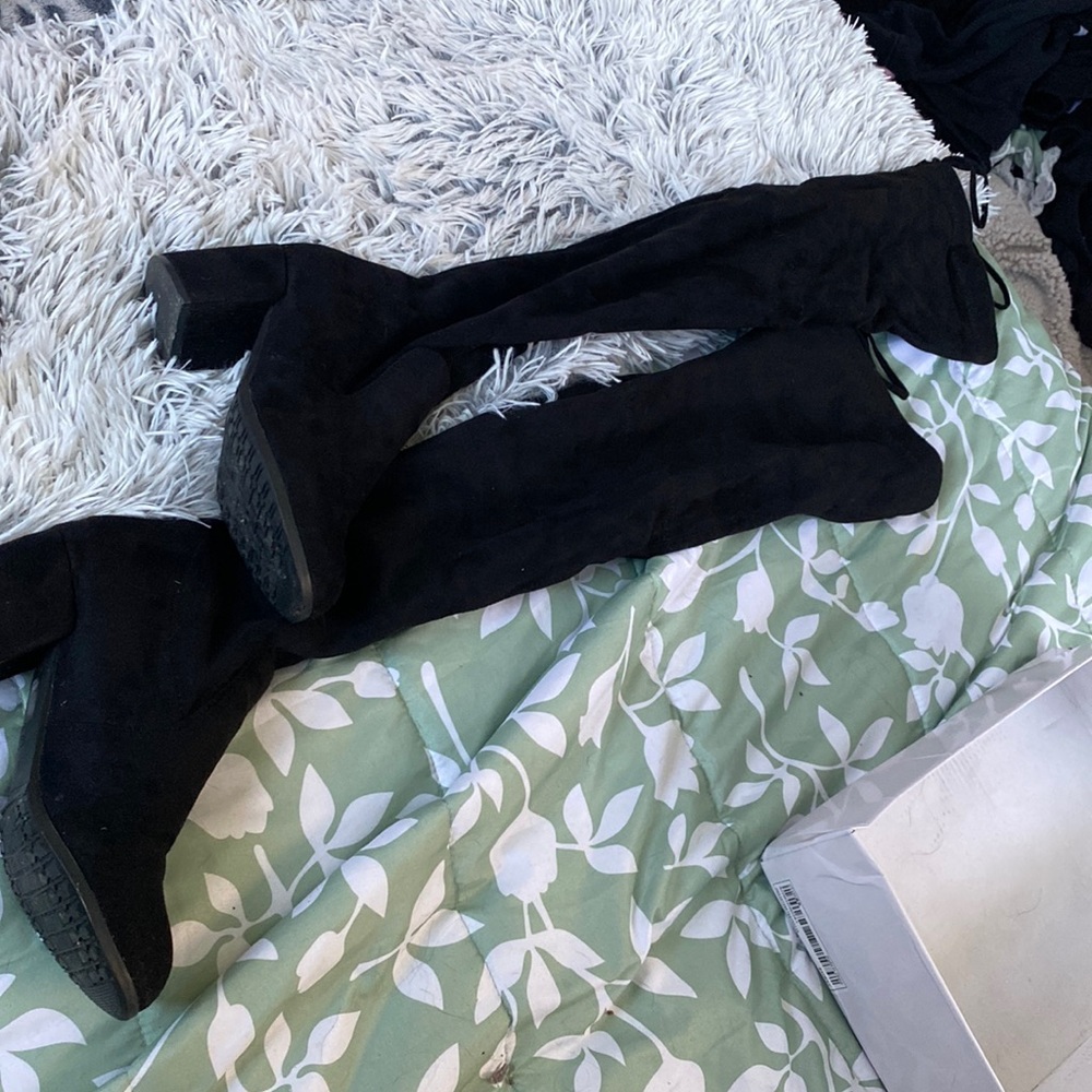 thigh high heeled black boots